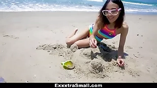 Young woman enjoys passionate beach big cock blowjob